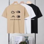 2025 North Face summer new style, with abstract mountain pattern on the back and classic brand logo print