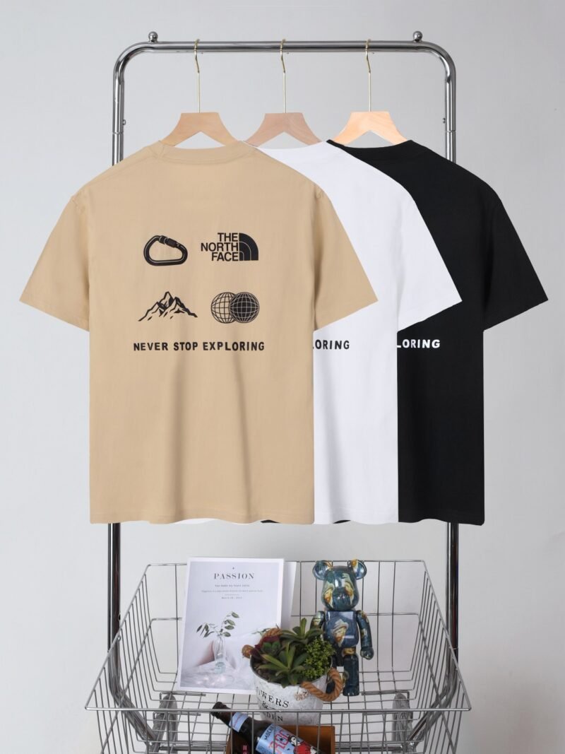 2025 North Face summer new style, with abstract mountain pattern on the back and classic brand logo print